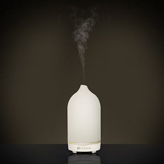 موزع العطور الأبيض من ثان أروما جيني